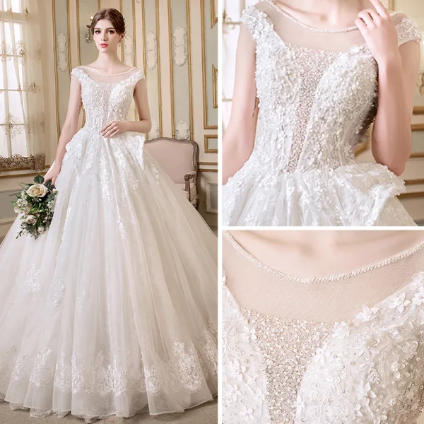 Elegante Ivory / Creme Durchsichtige Brautkleider 2018 A Linie Rundhalsausschnitt Ärmel Rückenfreies Applikationen Mit Spitze Perle Kristall Perlenstickerei Kapelle-Schleppe Rüschen