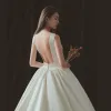 Modest / Simple Ivory Wedding Dresses 2018 Ball Gown Scoop Neck Sleeveless Backless Royal Train Ruffle