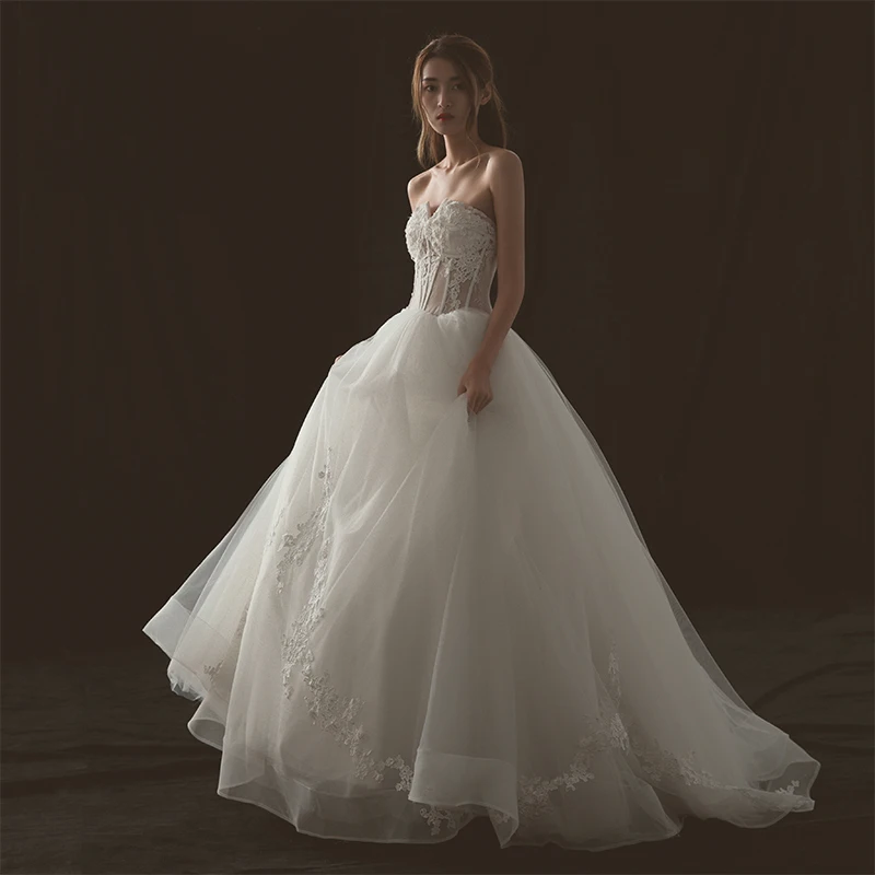 Illusjon Elfenben Brudekjoler 2018 Ballkjole Kjæreste Uten Ermer Ryggløse Appliques Boret Blonder Feie Tog Buste