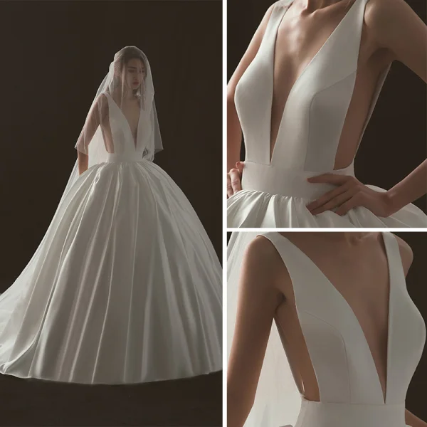 Sexy Ivoire Robe De Mariée 2018 Robe Boule V-Cou Sans Manches Dos Nu Cathedral Train Volants