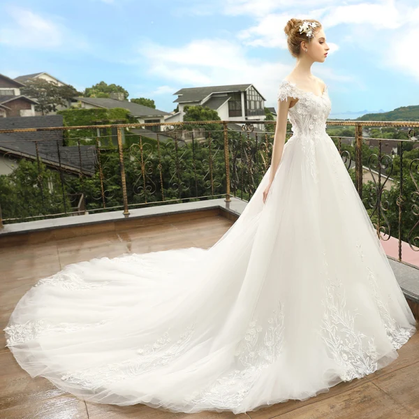 Elegant Ivory Wedding Dresses 2018 A-Line / Princess Off-The-Shoulder Short Sleeve Backless Appliques Flower Lace Pearl Cathedral Train Ruffle