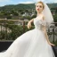 Elegant Ivory Wedding Dresses 2018 A-Line / Princess Off-The-Shoulder Short Sleeve Backless Appliques Flower Lace Pearl Cathedral Train Ruffle