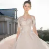 Elegant Champagne See-through Wedding Dresses 2018 Ball Gown Scoop Neck 1/2 Sleeves Appliques Pierced Lace Cathedral Train Ruffle