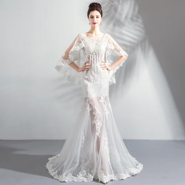 Chic / Belle Blanche Plage Robe De Mariée 2018 Trompette / Sirène Encolure Dégagée Transparentes Manches Longues Dos Nu Appliques En Dentelle Train De Balayage