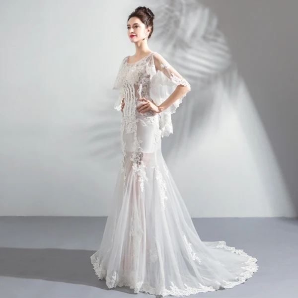 Chic / Belle Blanche Plage Robe De Mariée 2018 Trompette / Sirène Encolure Dégagée Transparentes Manches Longues Dos Nu Appliques En Dentelle Train De Balayage