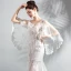 Chic / Belle Blanche Plage Robe De Mariée 2018 Trompette / Sirène Encolure Dégagée Transparentes Manches Longues Dos Nu Appliques En Dentelle Train De Balayage
