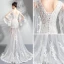 Chic / Belle Blanche Plage Robe De Mariée 2018 Trompette / Sirène Encolure Dégagée Transparentes Manches Longues Dos Nu Appliques En Dentelle Train De Balayage