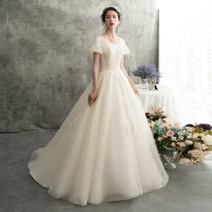Chic Belle Champagne Robe De Mariée 2018 Princesse V Cou Gonflée Manches Courtes Dos Nu Appliques En Dentelle Perlage Train De Balayage Volants