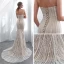 Chic / Belle Champagne Robe De Soirée 2018 Trompette / Sirène Bustier Sans Manches Appliques En Dentelle Tribunal Train Volants Dos Nu Robe De Ceremonie