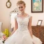 Illusion Ivoire Transparentes Robe De Mariée 2018 Robe Boule Encolure Dégagée Sans Manches Appliques Fleur Perlage Perle Cathedral Train Volants