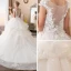 Illusion Ivoire Transparentes Robe De Mariée 2018 Robe Boule Encolure Dégagée Sans Manches Appliques Fleur Perlage Perle Cathedral Train Volants