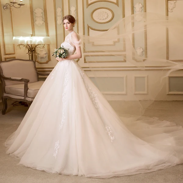 Elegante Durchsichtige Champagner Brautkleider 2018 A Linie Stehkragen Bandeau Ärmellos Applikationen Mit Spitze Perlenstickerei Kathedrale Schleppe Rüschen