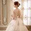 Elegante Champagner Brautkleider 2018 Ballkleid Durchsichtige V-Ausschnitt Ärmellos Rückenfreies Applikationen Mit Spitze Perlenstickerei Kathedrale Schleppe Rüschen