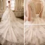 Elegante Champagner Brautkleider 2018 Ballkleid Durchsichtige V-Ausschnitt Ärmellos Rückenfreies Applikationen Mit Spitze Perlenstickerei Kathedrale Schleppe Rüschen