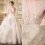 Elegante Champagner Brautkleider 2018 Ballkleid Durchsichtige V-Ausschnitt Ärmellos Rückenfreies Applikationen Mit Spitze Perlenstickerei Kathedrale Schleppe Rüschen