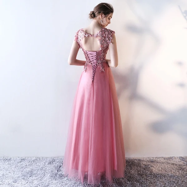 Schöne Pink Abendkleider 2017 A Linie Rundhalsausschnitt Ärmellos Applikationen Blumen Perle Strass Pailletten Schleife Stoffgürtel Lange Rüschen Rückenfreies Festliche Kleider