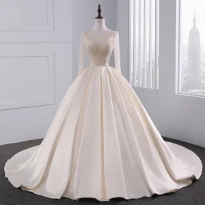 Luxury Gorgeous Champagne Wedding Dresses 2017 Ball Gown Pierced V Neck Long Sleeve Backless Beading Pearl Rhinestone Chapel Train Ruffle