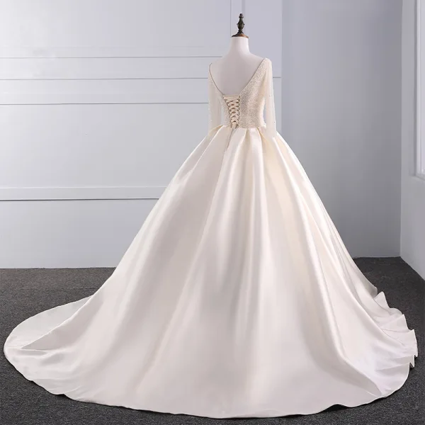 Luxury / Gorgeous Champagne Wedding Dresses 2017 Ball Gown Pierced V-Neck Long Sleeve Backless Beading Pearl Rhinestone Chapel Train Ruffle