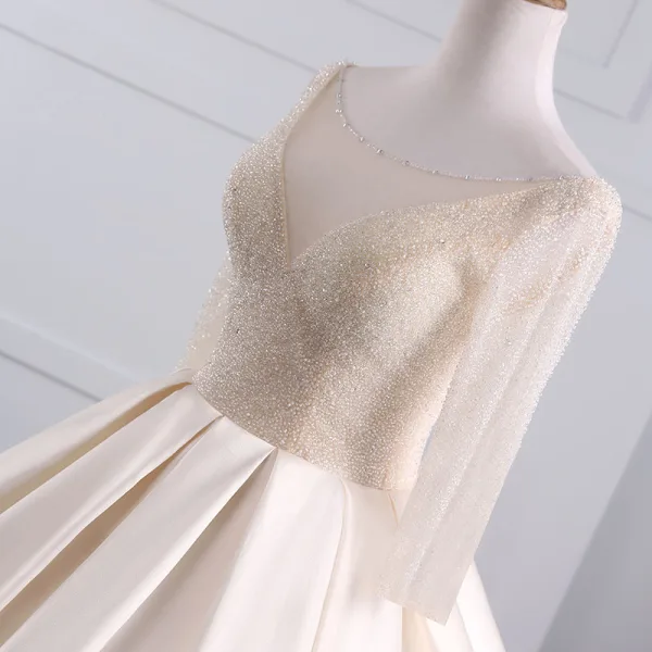 Luxury / Gorgeous Champagne Wedding Dresses 2017 Ball Gown Pierced V-Neck Long Sleeve Backless Beading Pearl Rhinestone Chapel Train Ruffle