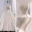 Luxury / Gorgeous Champagne Wedding Dresses 2017 Ball Gown Pierced V-Neck Long Sleeve Backless Beading Pearl Rhinestone Chapel Train Ruffle