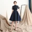 Modern / Fashion Navy Blue Homecoming Graduation Dresses 2018 A-Line / Princess High Neck See-through Short Sleeve Appliques Lace Beading Knee-Length Ruffle Backless Formal Dresses