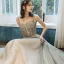Charmant Champagne Robe De Soirée 2020 Princesse Bretelles Spaghetti Perlage En Dentelle Fleur Sans Manches Dos Nu Longue Robe De Ceremonie