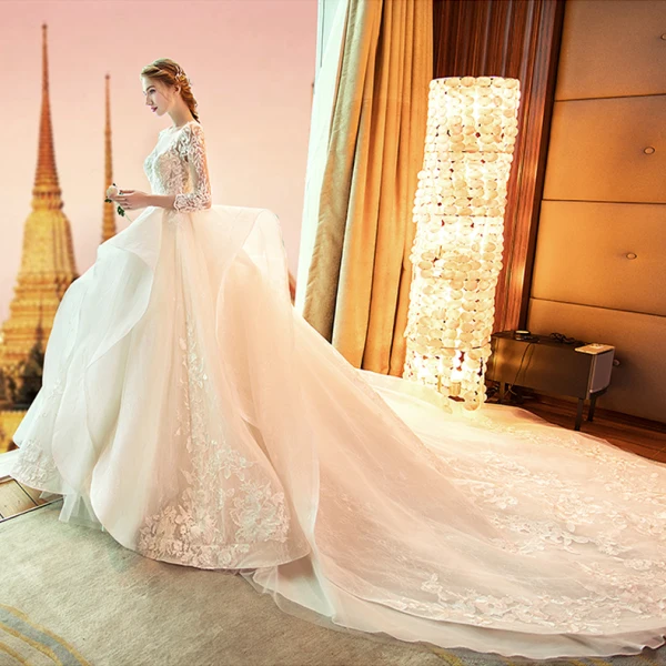 Audrey Hepburn Style Champagne Wedding Dresses 2019 Ball Gown See-through Scoop Neck Lace Appliques 3/4 Sleeve Backless Cascading Ruffles Royal Train