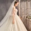 Fabuleux Champagne Robe De Mariée 2019 Princesse Bustier Perlage Paillettes Sans Manches Dos Nu Appliques Noeud Royal Train