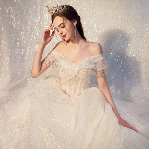 Fabulous Champagne Wedding Dresses 2019 Ball Gown Off-The-Shoulder Sequins Beading Tassel Short Sleeve Backless Royal Train