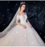 Charmant Ivoire Robe De Mariée 2019 Robe Boule De l'épaule Perlage Paillettes Manches Courtes Dos Nu Cathedral Train