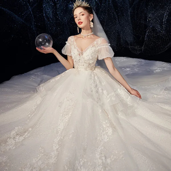 High-end Ivory Wedding Dresses 2020 Ball Gown V-Neck Beading Pearl Sequins Lace Flower Appliques Short Sleeve Backless Royal Train