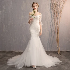 Fantastiske Unike Hvit Trompet Havfrue Brudekjoler 2019 Blonder Tyll Appliques Ryggløse Brodert Strapless Domstol Tog Kirke Bryllup