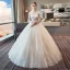 Élégant Ivoire Robe De Mariée 2018 Robe Boule Encolure Dégagée Manches Longues Dos Nu Appliques Percé En Dentelle Longue Volants