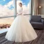 Élégant Ivoire Robe De Mariée 2018 Robe Boule Encolure Dégagée Manches Longues Dos Nu Appliques Percé En Dentelle Longue Volants