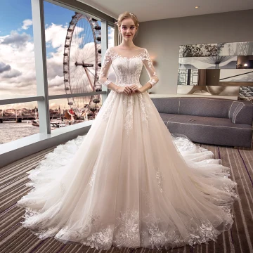 Élégant Ivoire Transparentes Robe De Mariée 2018 Robe Boule Encolure Dégagée 3 4 Manches Dos Nu Appliques Percé En Dentelle Royal Train Volants