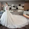 Luxury / Gorgeous Ivory Wedding Dresses 2018 Ball Gown V-Neck Short Sleeve Backless Glitter Tulle Beading Royal Train Ruffle