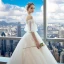 Elegante Ivory / Creme Brautkleider 2018 Ballkleid Off Shoulder 1/2 Ärmel Rückenfreies Perlenstickerei Pailletten Applikationen Mit Spitze Kathedrale Schleppe Rüschen