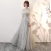 Eleganckie Szary Przezroczyste Sukienki Na Bal 2018 Princessa Wysokiej Szyi Długie Rękawy Aplikacje Z Koronki Perła Szarfa Długie Bez Pleców Wzburzyć Sukienki Wizytowe