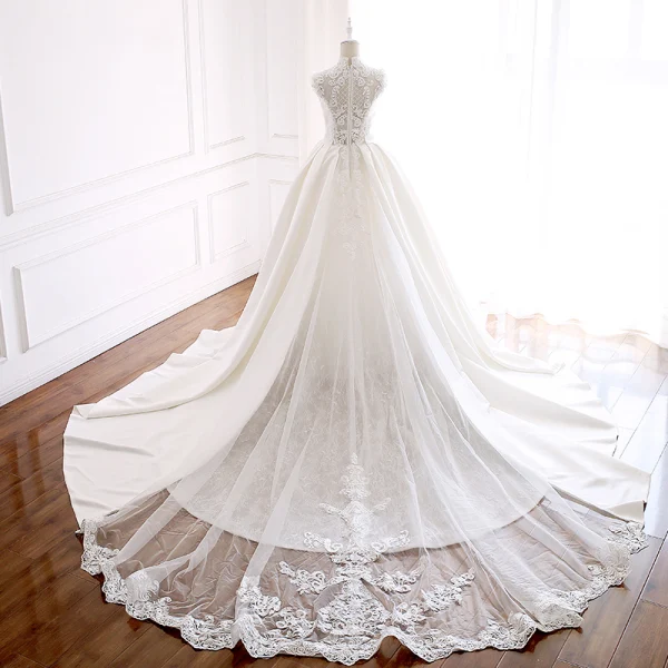 Luxury / Gorgeous Ivory Pierced Wedding Dresses 2018 Ball Gown High Neck Sleeveless Appliques Lace Crystal Beading Pearl Royal Train Ruffle
