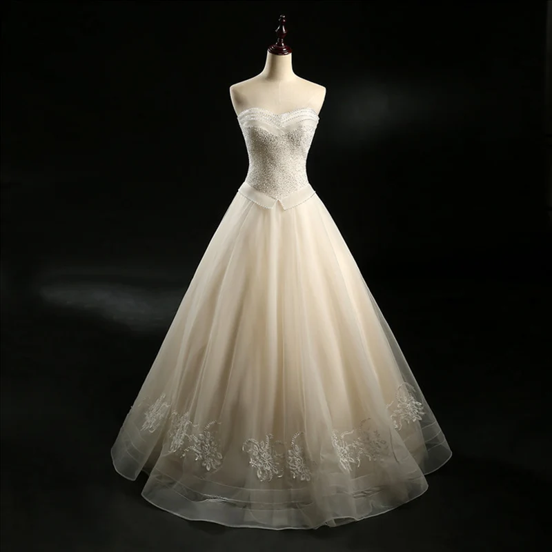 Fine Champagne Brudekjoler 2018 Prinsesse Kjæreste Uten Ermer Ryggløse Appliques Blonder Paljetter Beading Lange Buste