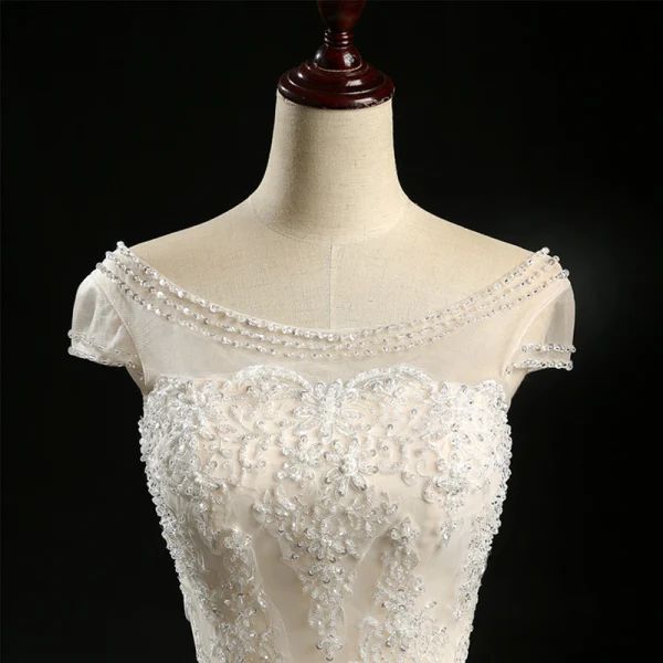 Vintage / Retro Champagne See-through Wedding Dresses 2018 Ball Gown Scoop Neck Cap Sleeves Appliques Lace Sequins Beading Floor-Length / Long Ruffle