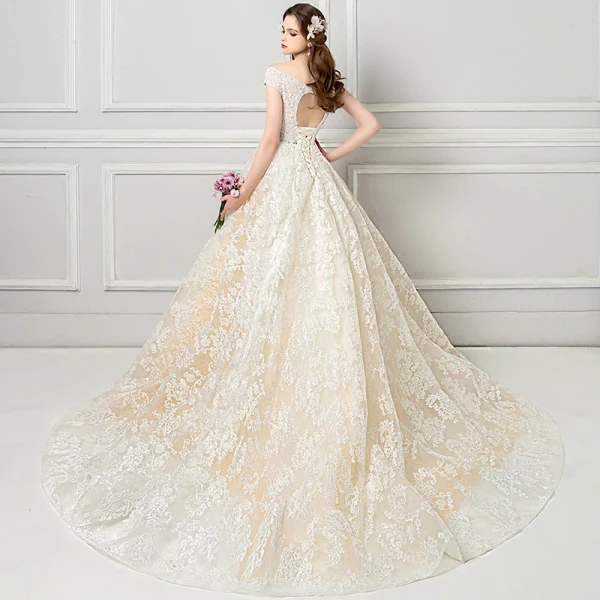 Elegant See-through Champagne Wedding Dresses 2018 Ball Gown V-Neck Cap Sleeves Backless Appliques Lace Pearl Ruffle Cathedral Train