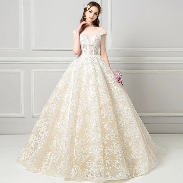 Elegant See-through Champagne Wedding Dresses 2018 Ball Gown V-Neck Cap Sleeves Backless Appliques Lace Pearl Ruffle Cathedral Train