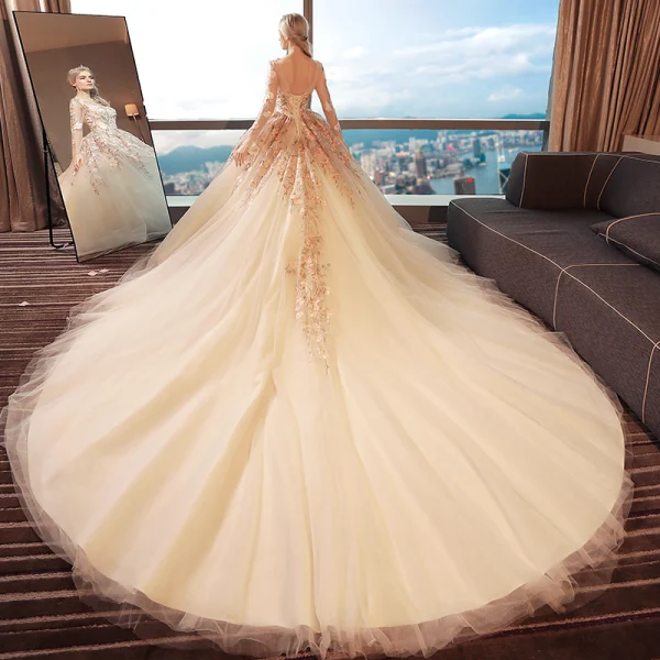 Chic / Beautiful White Pierced Wedding Dresses 2017 Ball Gown Scoop Neck Long Sleeve Appliques Lace Backless Cathedral Train