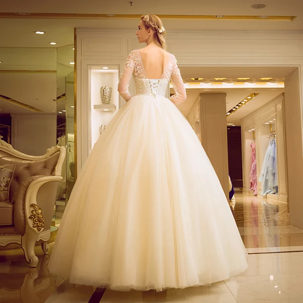 Chic / Beautiful Champagne Pierced Wedding Dresses 2017 Ball Gown Scoop Neck Long Sleeve Backless Appliques Flower Beading Bow Sash Floor-Length / Long