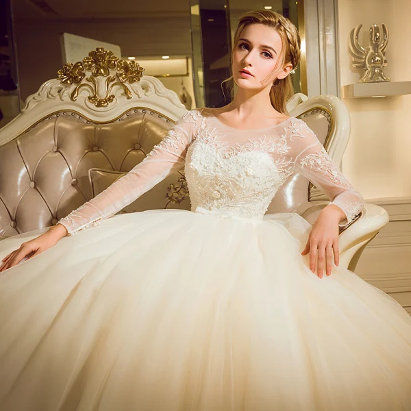 Chic / Beautiful Champagne Pierced Wedding Dresses 2017 Ball Gown Scoop Neck Long Sleeve Backless Appliques Flower Beading Bow Sash Floor-Length / Long