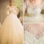 Chic / Beautiful Champagne Pierced Wedding Dresses 2017 Ball Gown Scoop Neck Long Sleeve Backless Appliques Flower Beading Bow Sash Floor-Length / Long