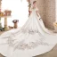 Stunning White Pierced Wedding Dresses 2018 Ball Gown V-Neck 1/2 Sleeves Backless Appliques Lace Beading Royal Train