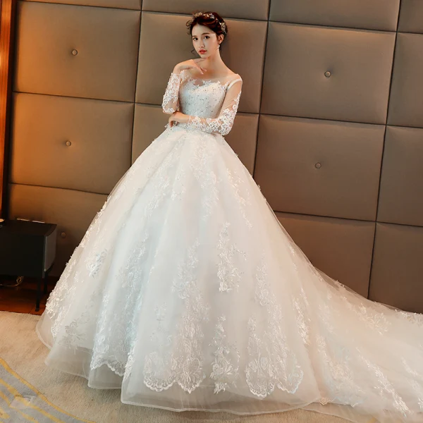 Schöne Weiß Durchbohrt Brautkleider 2017 Ballkleid Rundhalsausschnitt Lange Ärmel Rückenfreies Applikationen Mit Spitze Pailletten Perle Kapelle-Schleppe