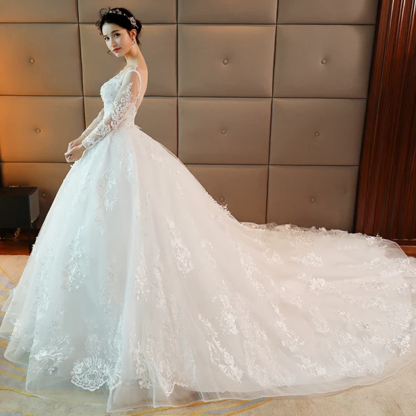 Schöne Weiß Durchbohrt Brautkleider 2017 Ballkleid Rundhalsausschnitt Lange Ärmel Rückenfreies Applikationen Mit Spitze Pailletten Perle Kapelle-Schleppe